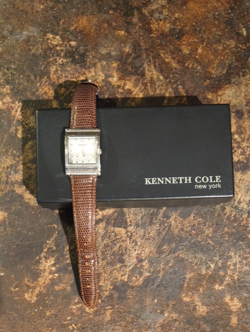Kenneth Cole New York Ladies Silver Case Watch with Brown Lizard Style Band Cool